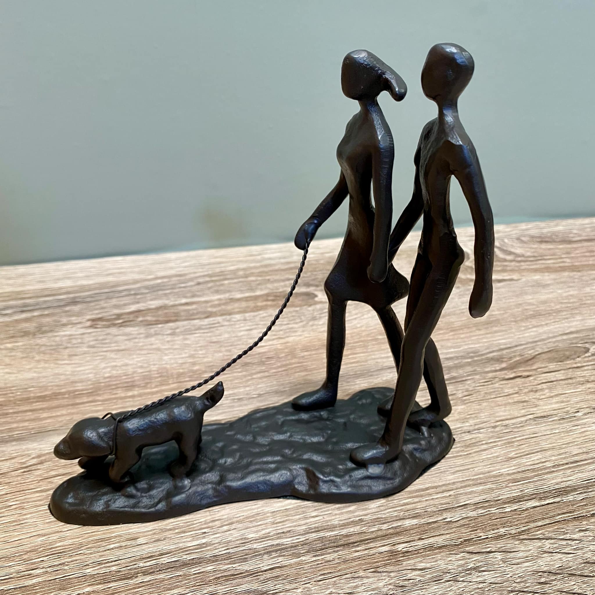 Metal Couple Walking The Dog