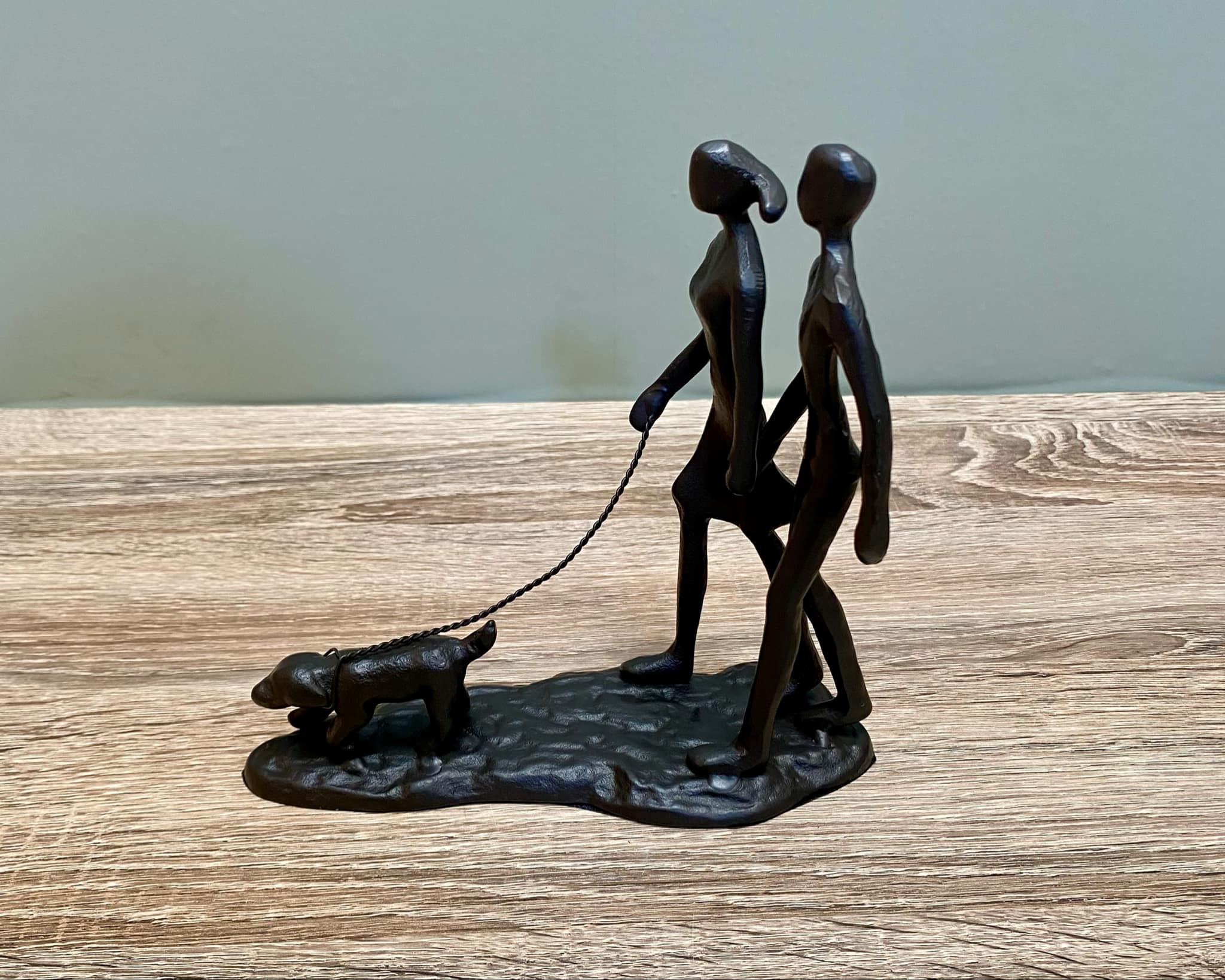 Metal Couple Walking The Dog