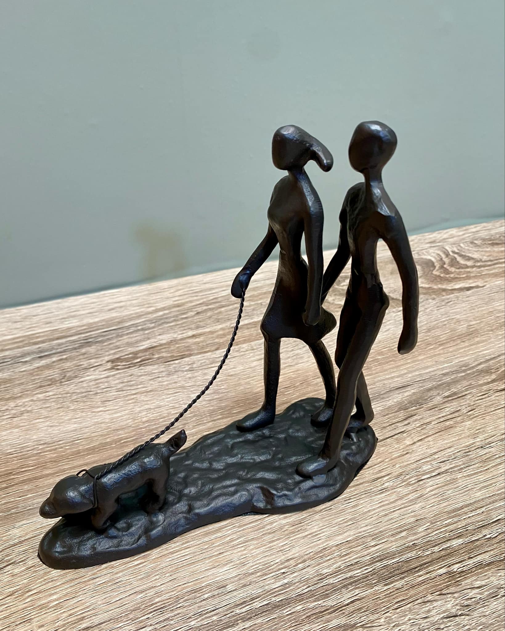 Metal Couple Walking The Dog