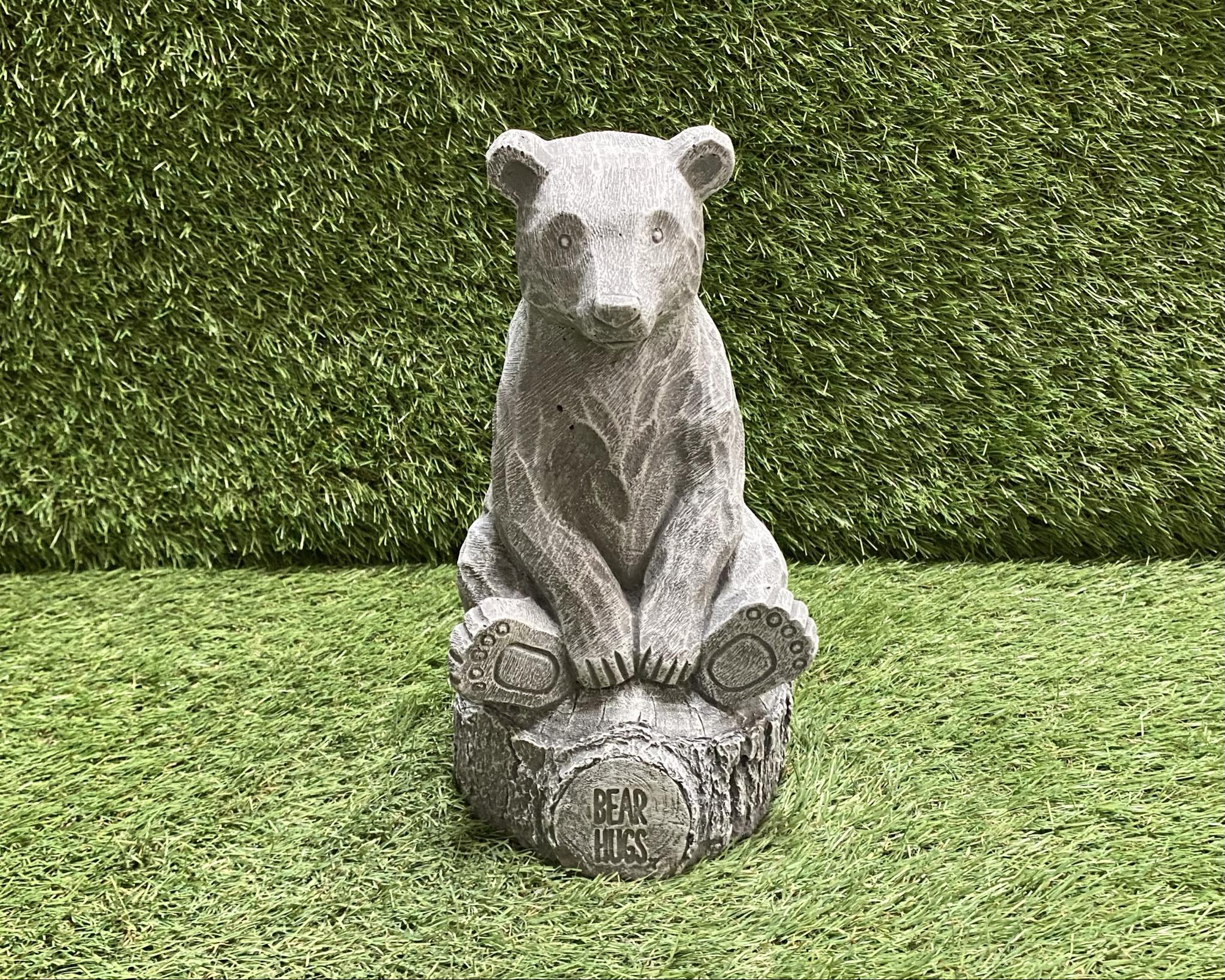 Bear Sitting On Stump