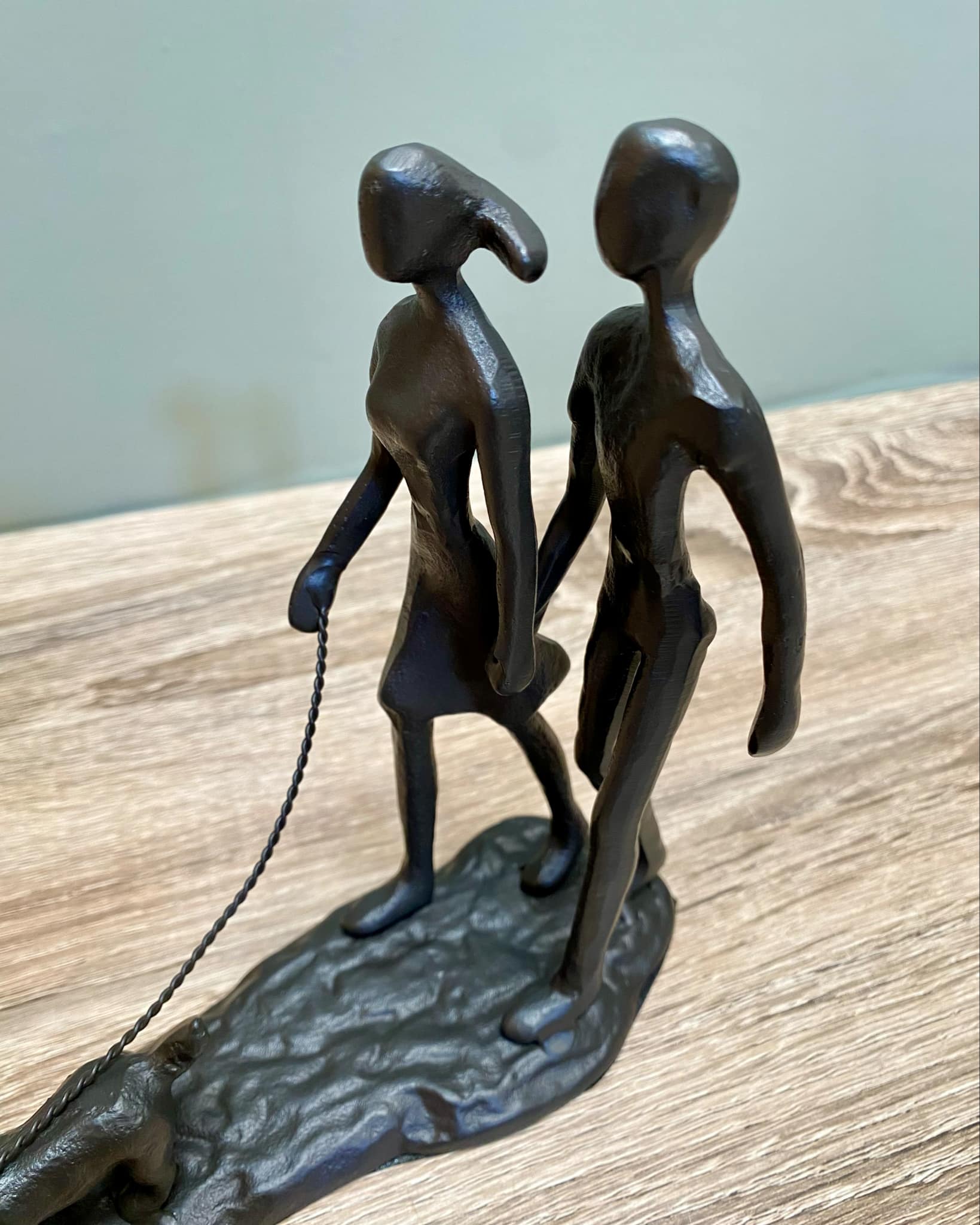 Metal Couple Walking The Dog
