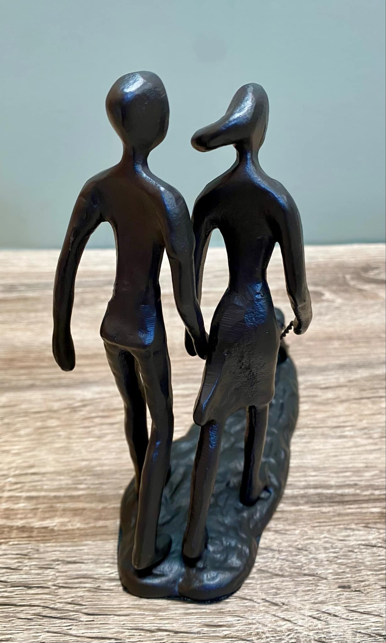 Metal Couple Walking The Dog