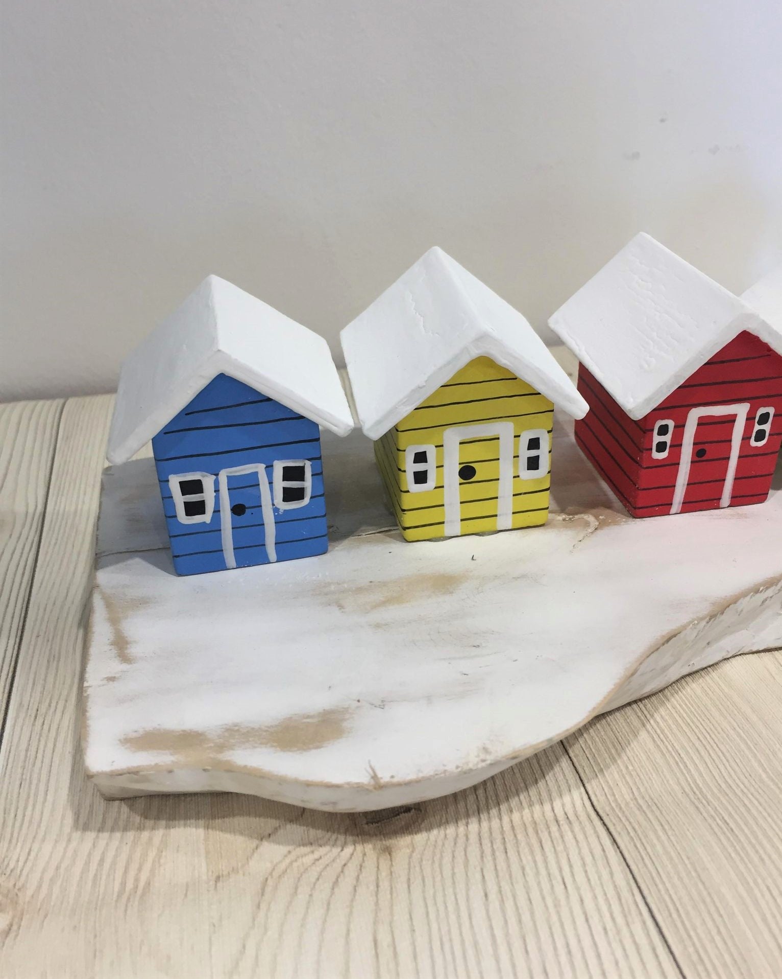 Coloured Beach Houses On A Block