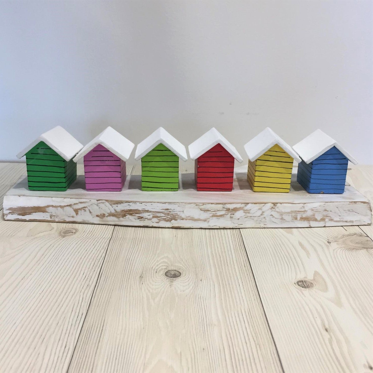 Coloured Beach Houses On A Block