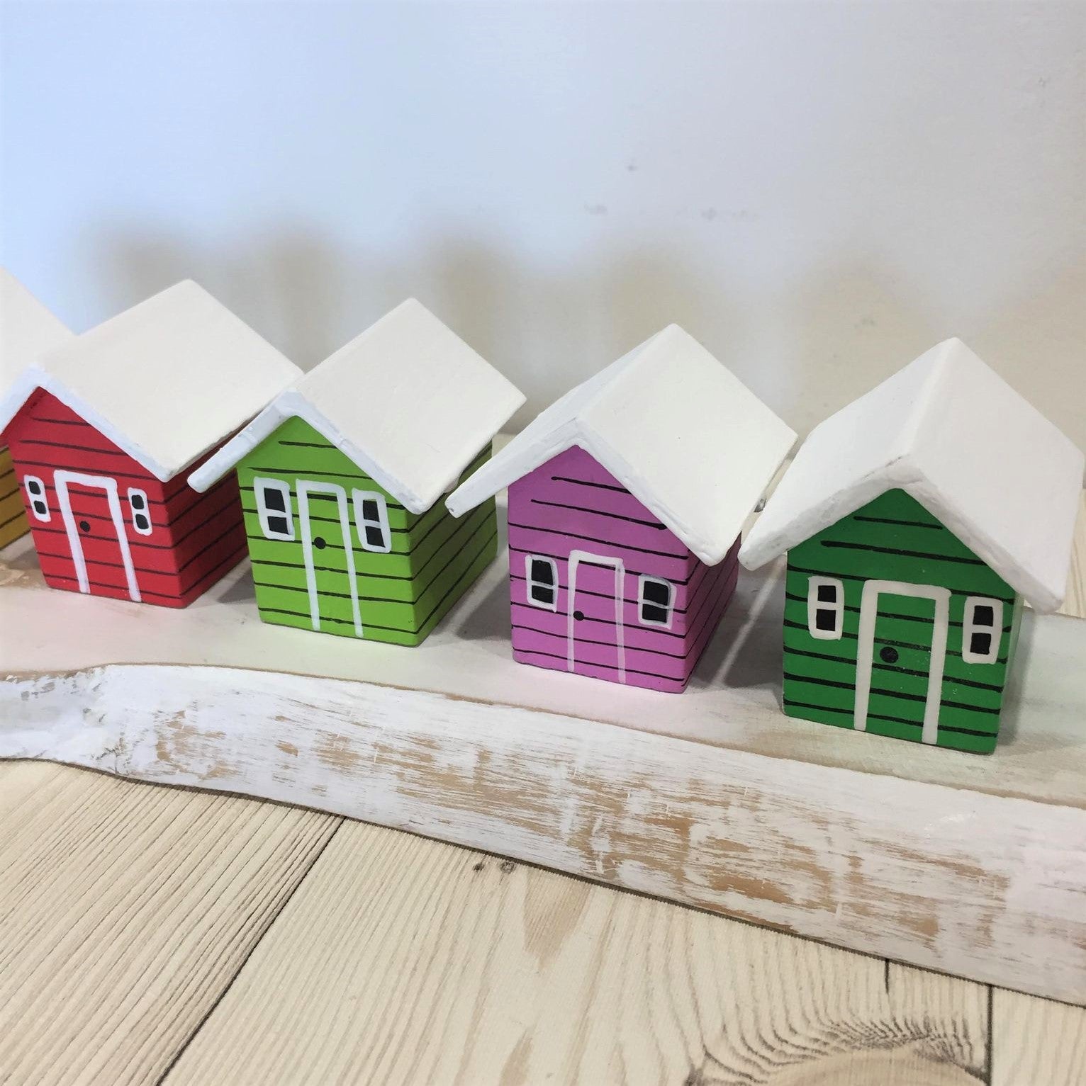 Coloured Beach Houses On A Block