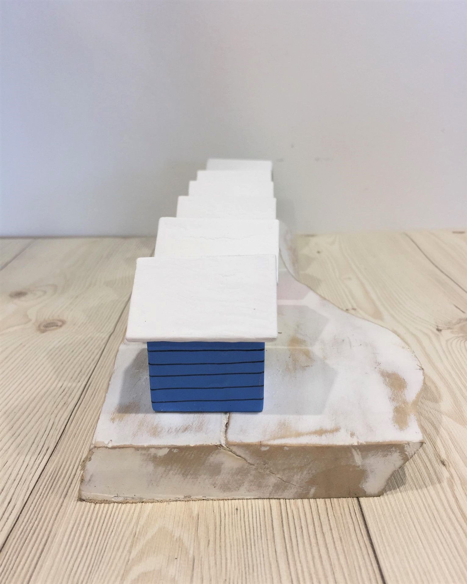 Coloured Beach Houses On A Block