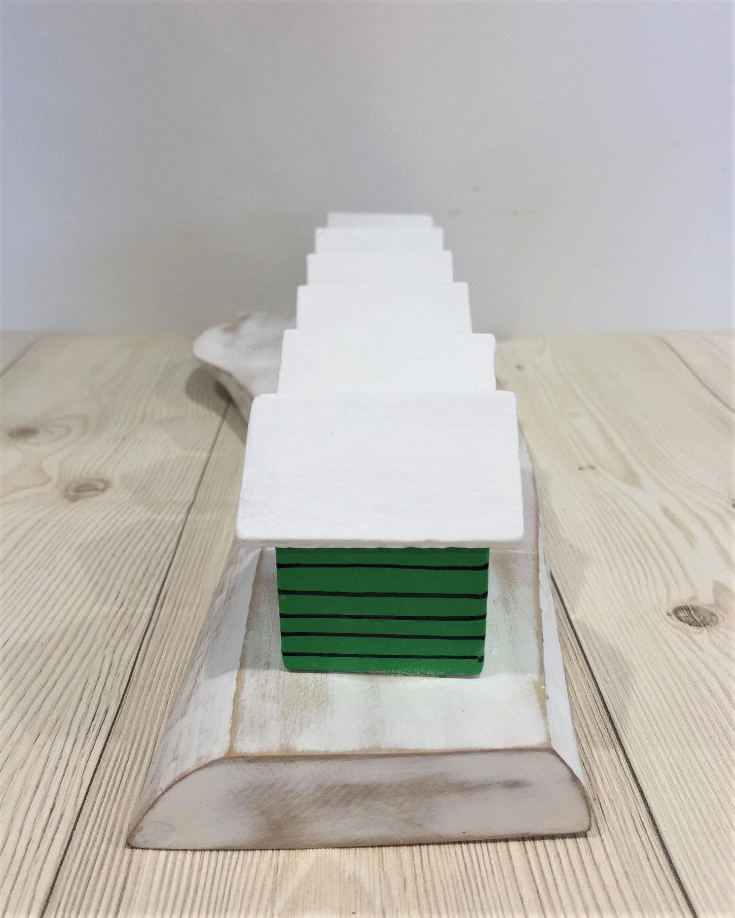 Coloured Beach Houses On A Block