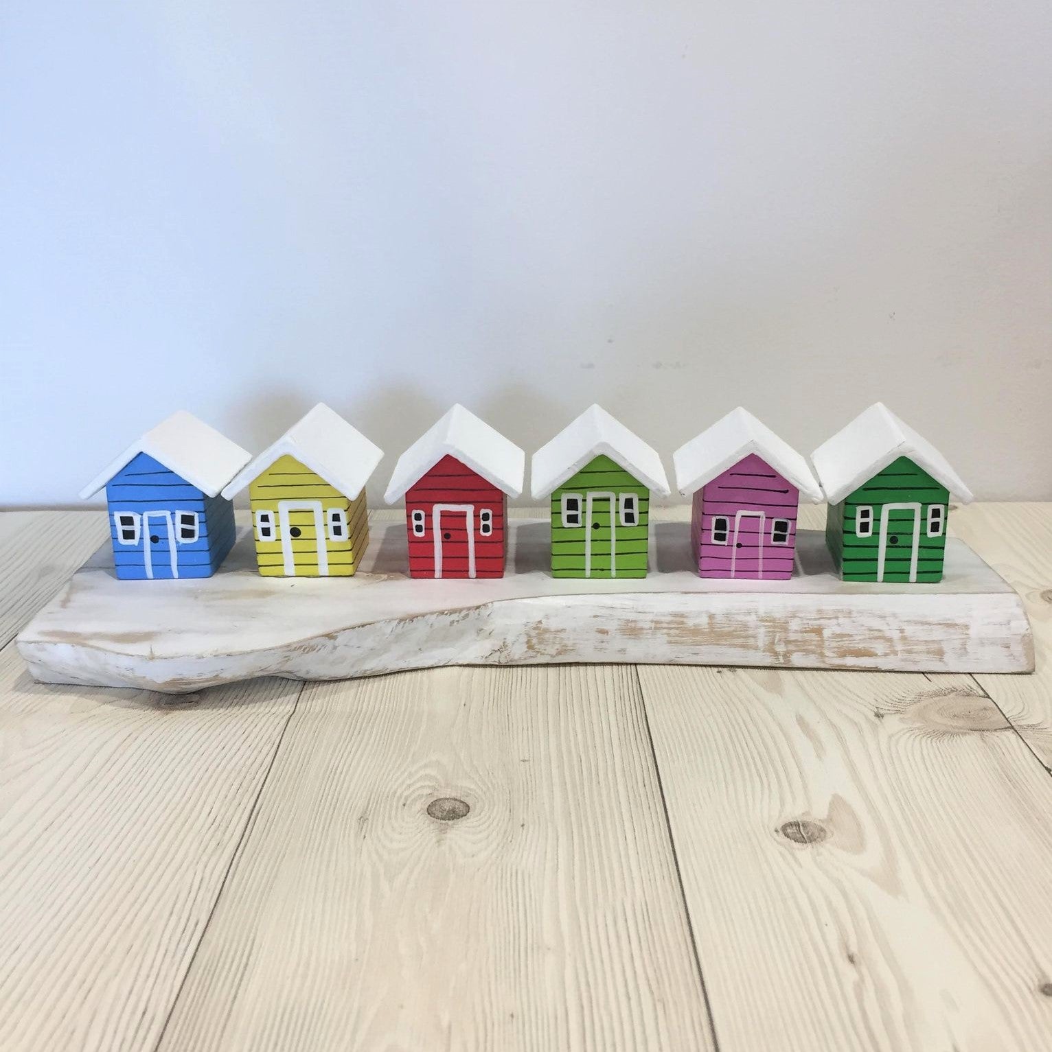 Coloured Beach Houses On A Block