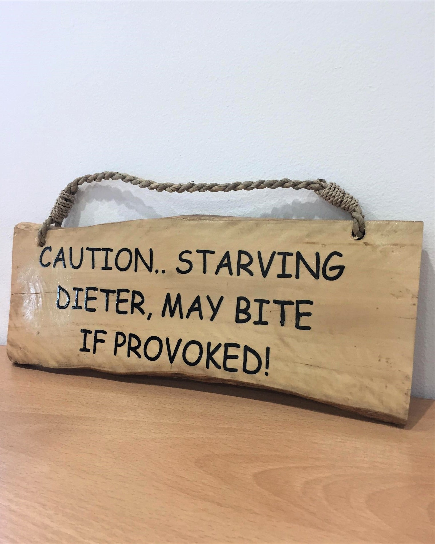 Sign - Caution.. Starving