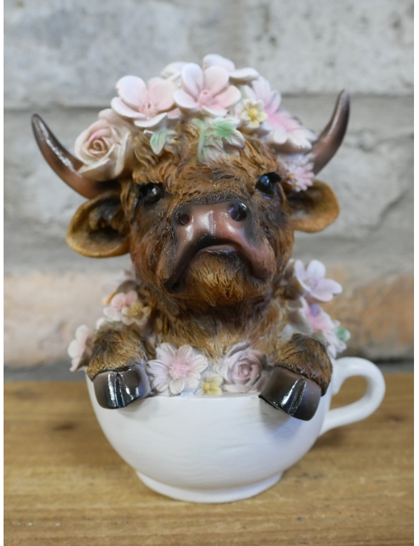 Small Highland Cow In A Tea Cup