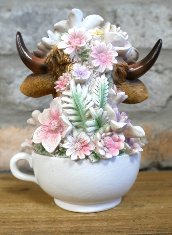 Small Highland Cow In A Tea Cup